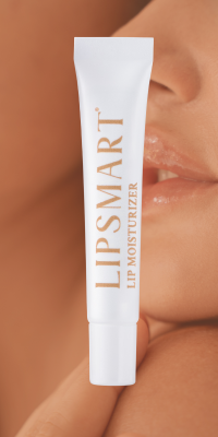 A tube of lipsmart moisturizing treatment in front of full, volumized lips